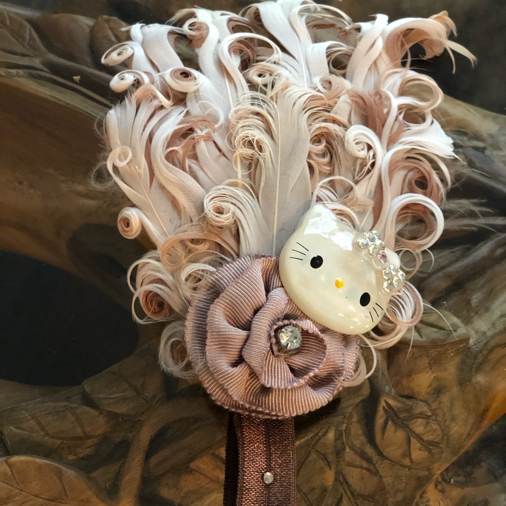 Brand New Hello Kitty Feather Headband Brand New Hello Kitty Feather Headband